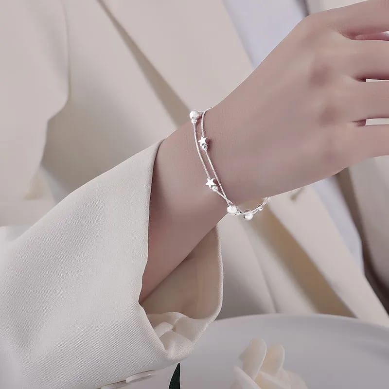 Pulsera doble estrellas y perlas