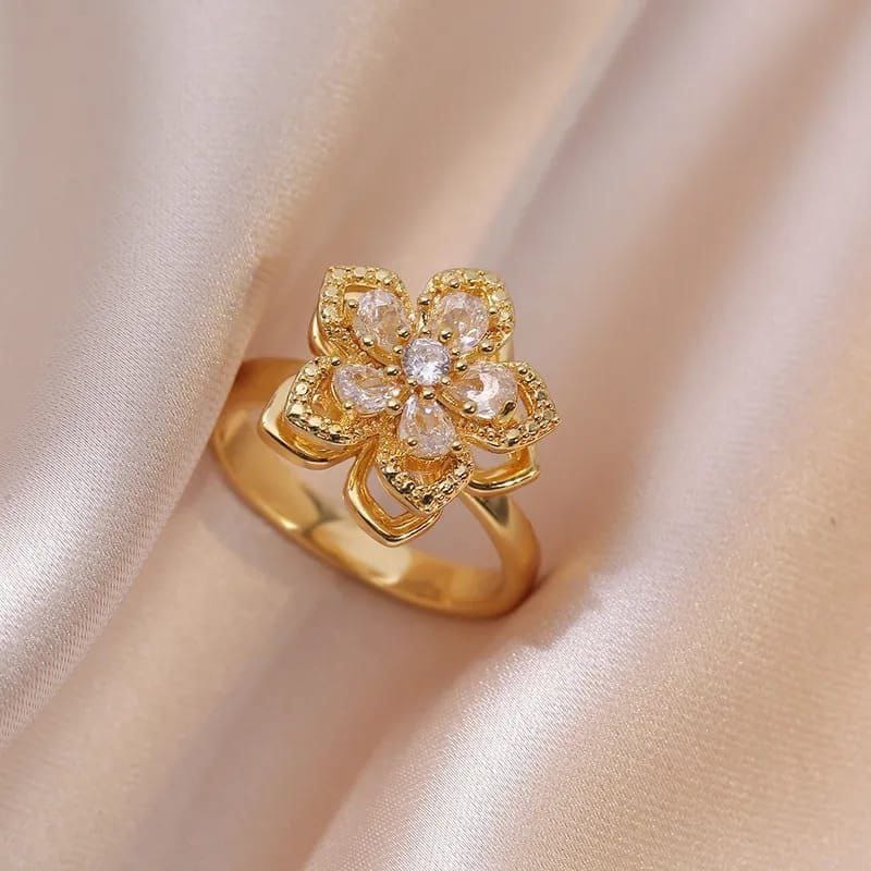 Anillo giratorio flor