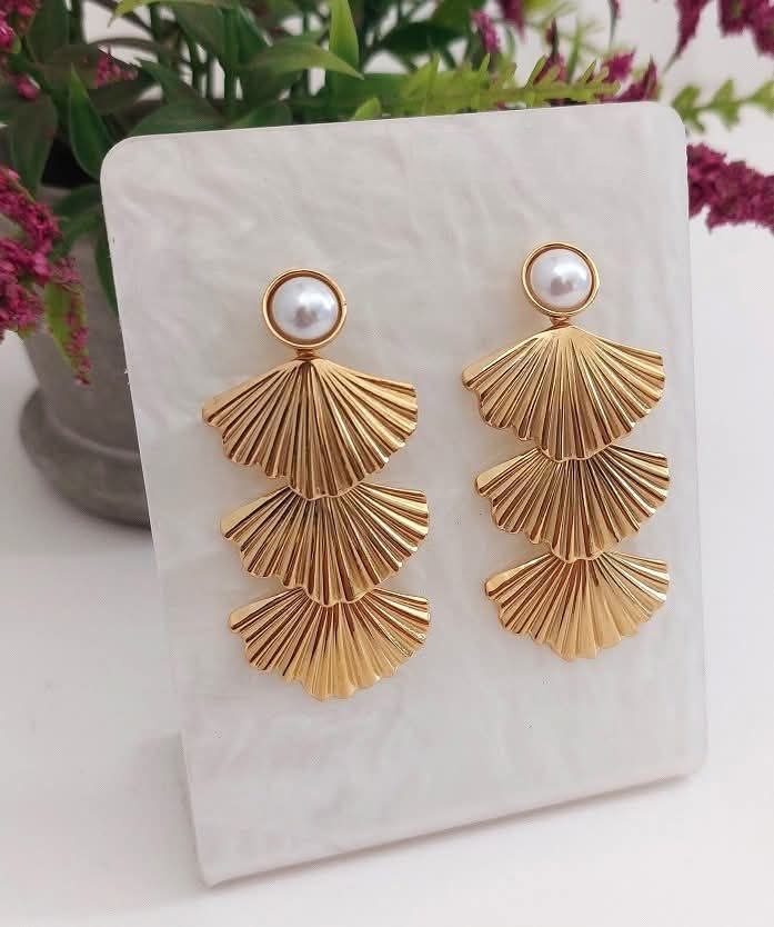 Aretes triples con perla