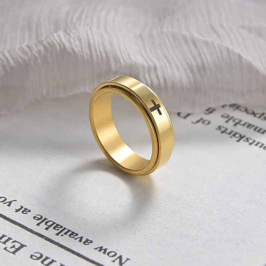 Anillo giratorio con cruz