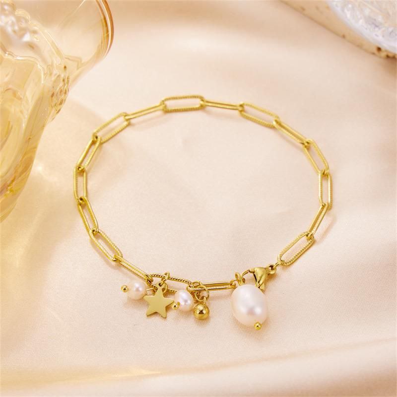 Pulsera perlas y estrella