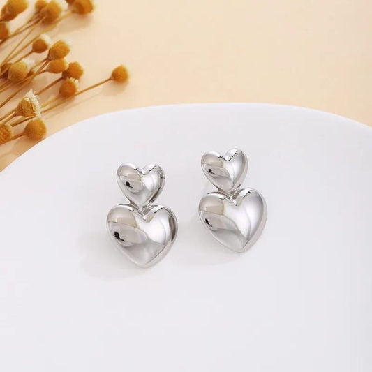 Aretes dobles corazones