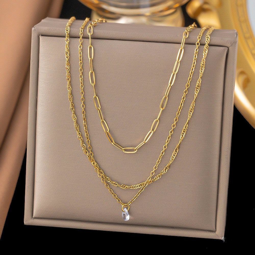 Cadena triple con circón