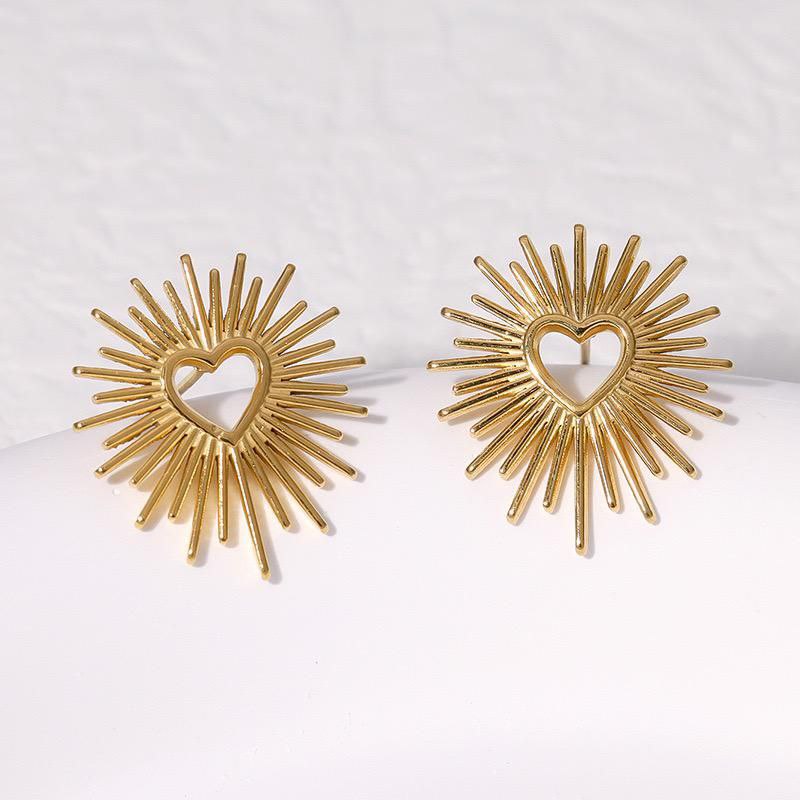 Aretes corazón con espinas