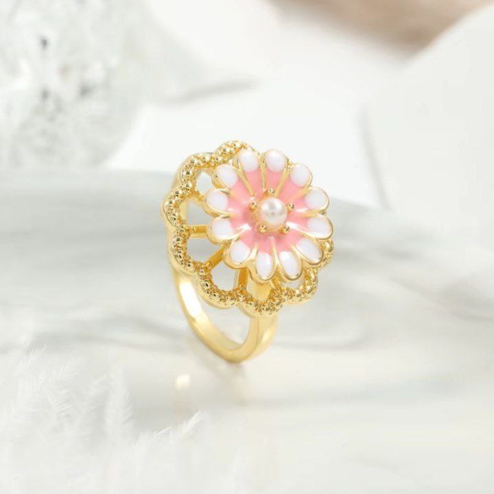 Anillo ajustable margarita giratoria