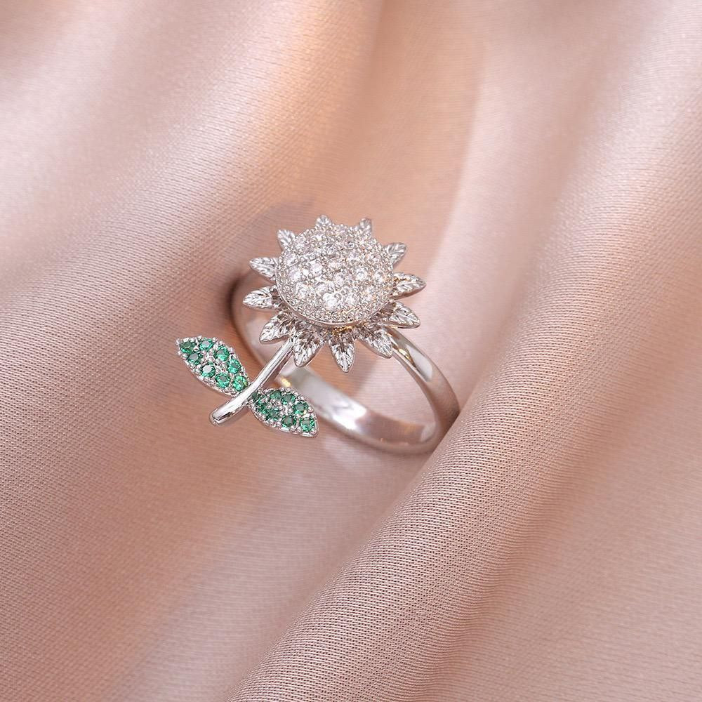 Anillo ajustable girasol giratorio