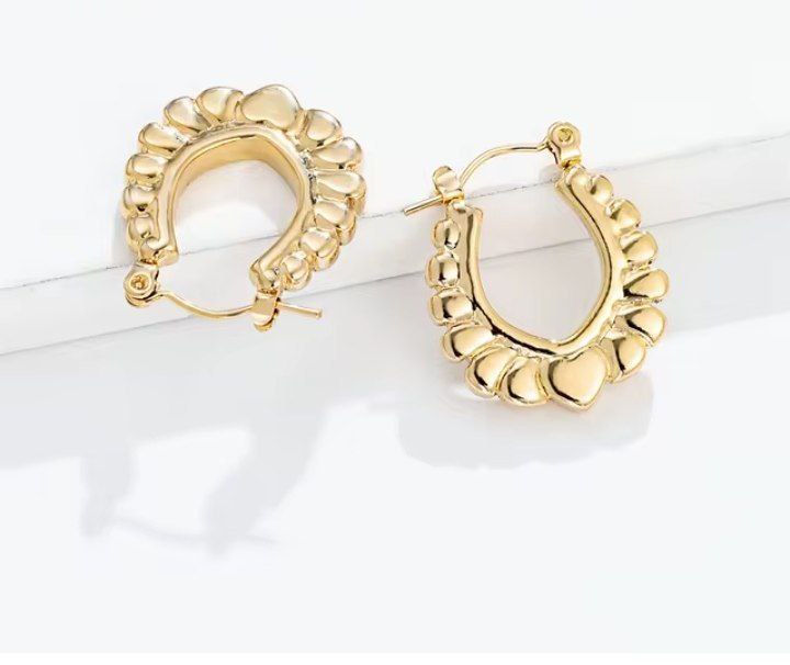 Argollas corazón labrado