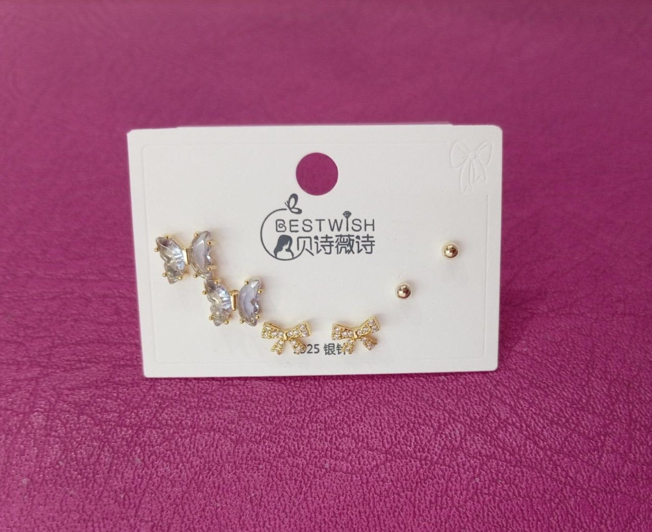 Set de tres pares de aretes  mariposas con lazos