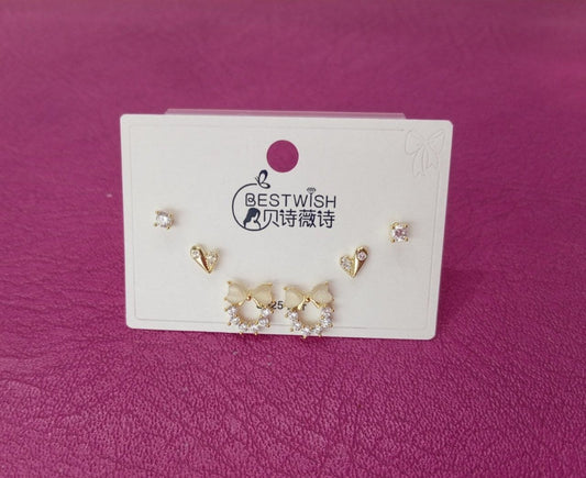 Set tres pares de aretes  de lazos con corazones