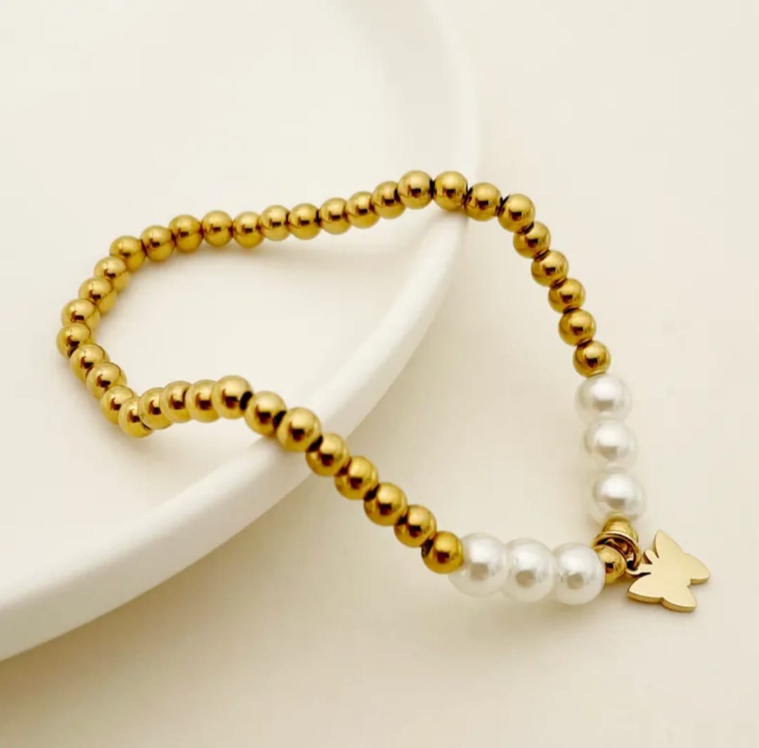 Pulsera perlas y mariposas