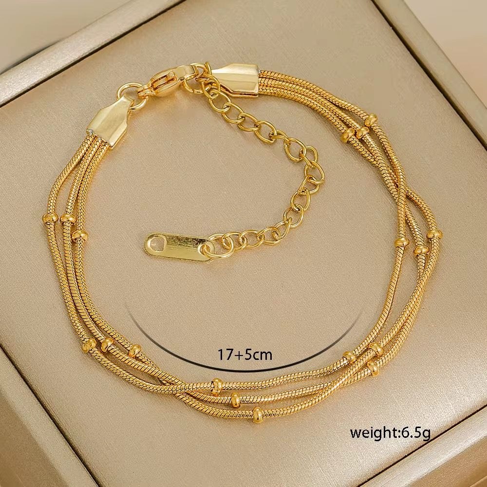 Pulsera Triple con Bolitas