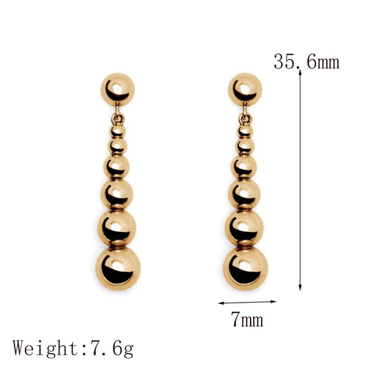 Aretes bolitas