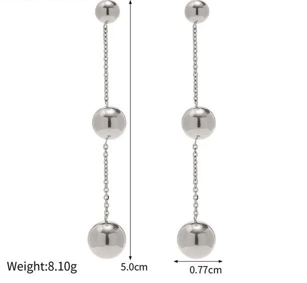Aretes largos bolitas
